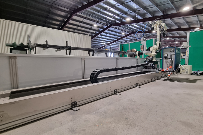Inside view of the S-4800 robotic welding cell and track
