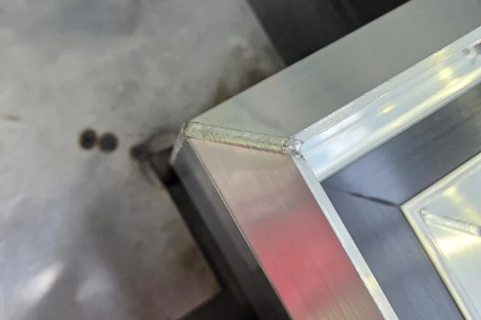 Laser-welded aluminium corner with a clean finish.