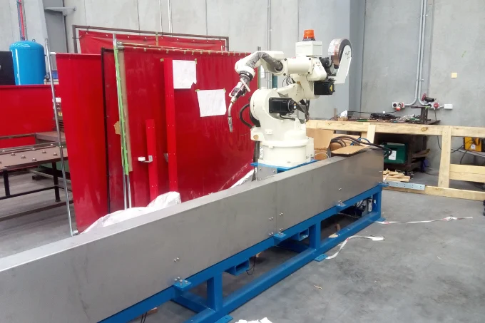 OTC FD-B6L robot during S-6000 robotic welding cell installation